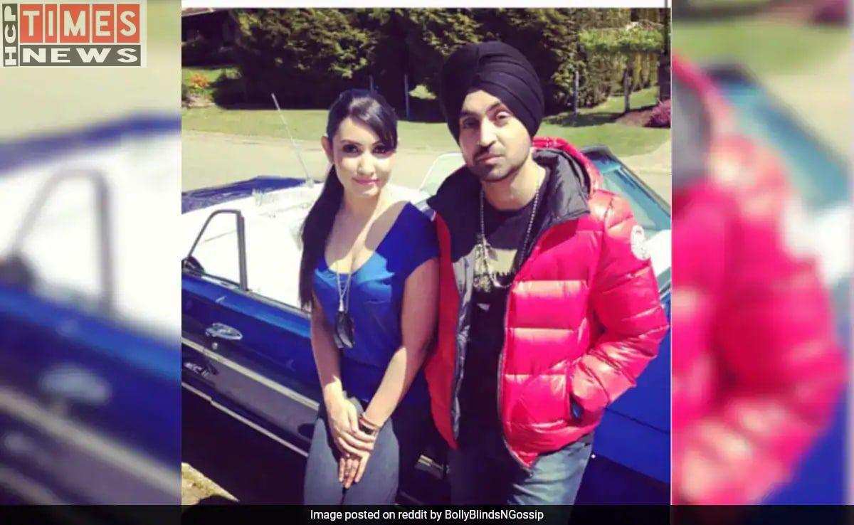 It reveals that the woman in the bizarrely popular photo is not Diljit Dosanjh's wife. View Post